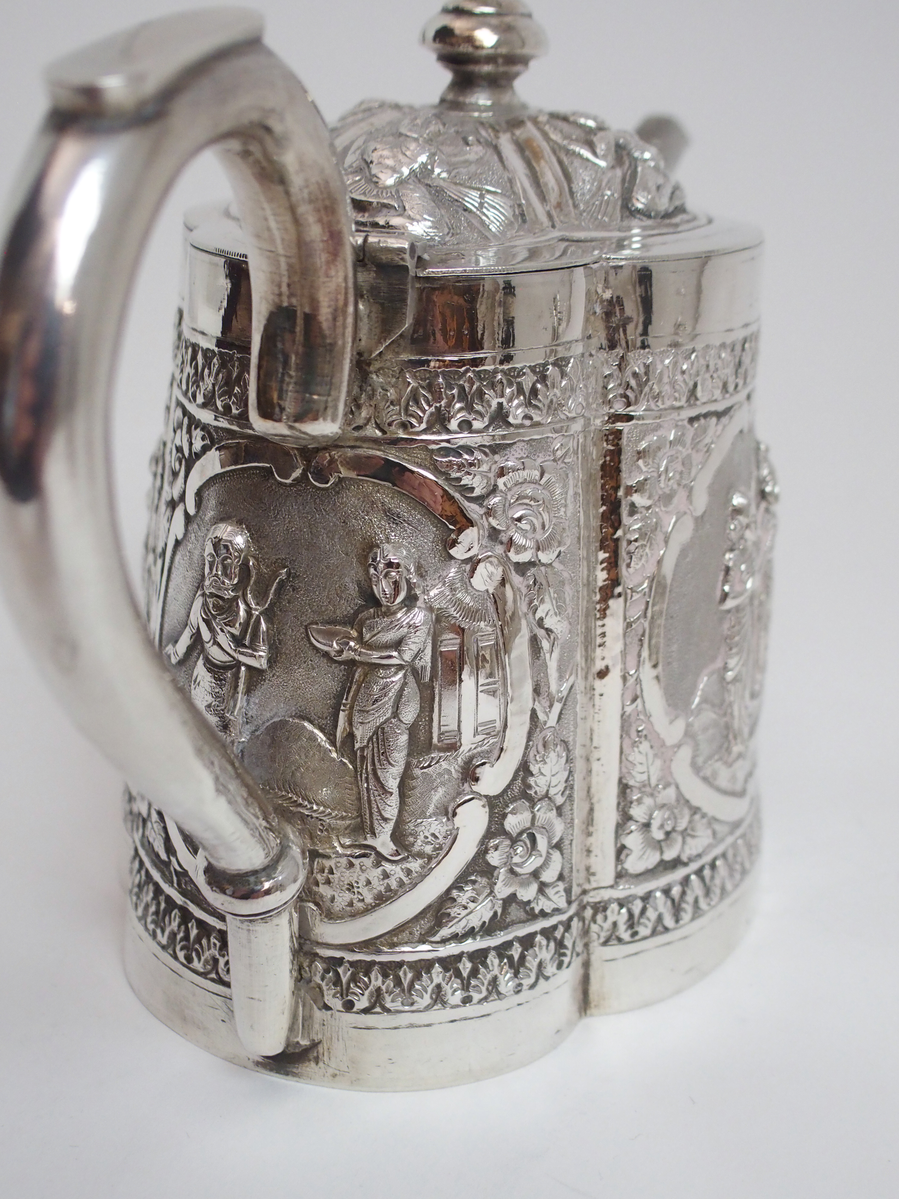 AN ASIAN WHITE METAL THREE PIECE TEA SERVICE cast and decorated with figures in cartouche panels - Image 8 of 13