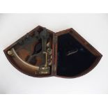 A VICTORIAN BRASS SEXTANT BY W. GERRARD, LIVERPOOL in a fitted mahogany box, together with several