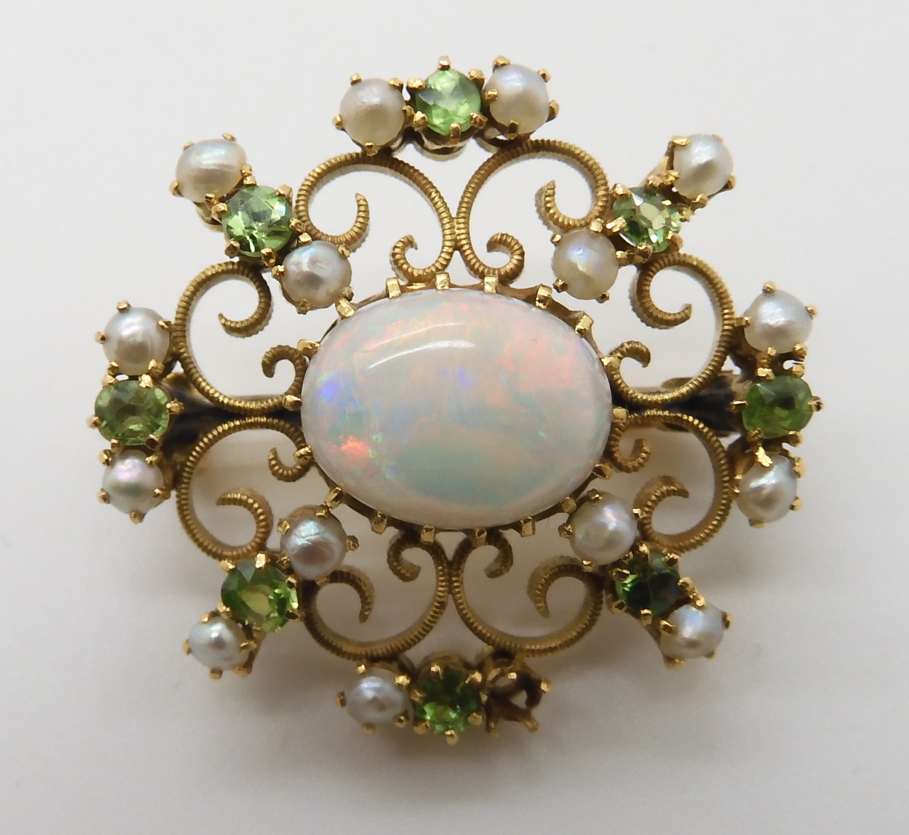TWO VINTAGE BROOCHES a yellow metal filigree example set with a white opal, demantoid garnets and - Image 3 of 6