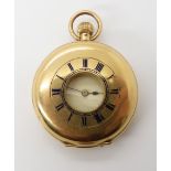 AN 18CT GOLD HALF HUNTER FOB WATCH with white enamelled dial, black Roman numerals and blued steel