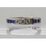 A SAPPHIRE AND DIAMOND ETERNITY RING set with square sapphires approx 2mm x 2mm and grain set