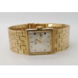 A 9CT GOLD RETRO LADIES RECORD DE LUXE WRISTWATCH with square cream dial, baton and squared