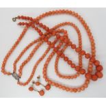 CORAL NECKLACES AND EARRINGS a double string of coral beads with 9ct diamond set clasp, length of