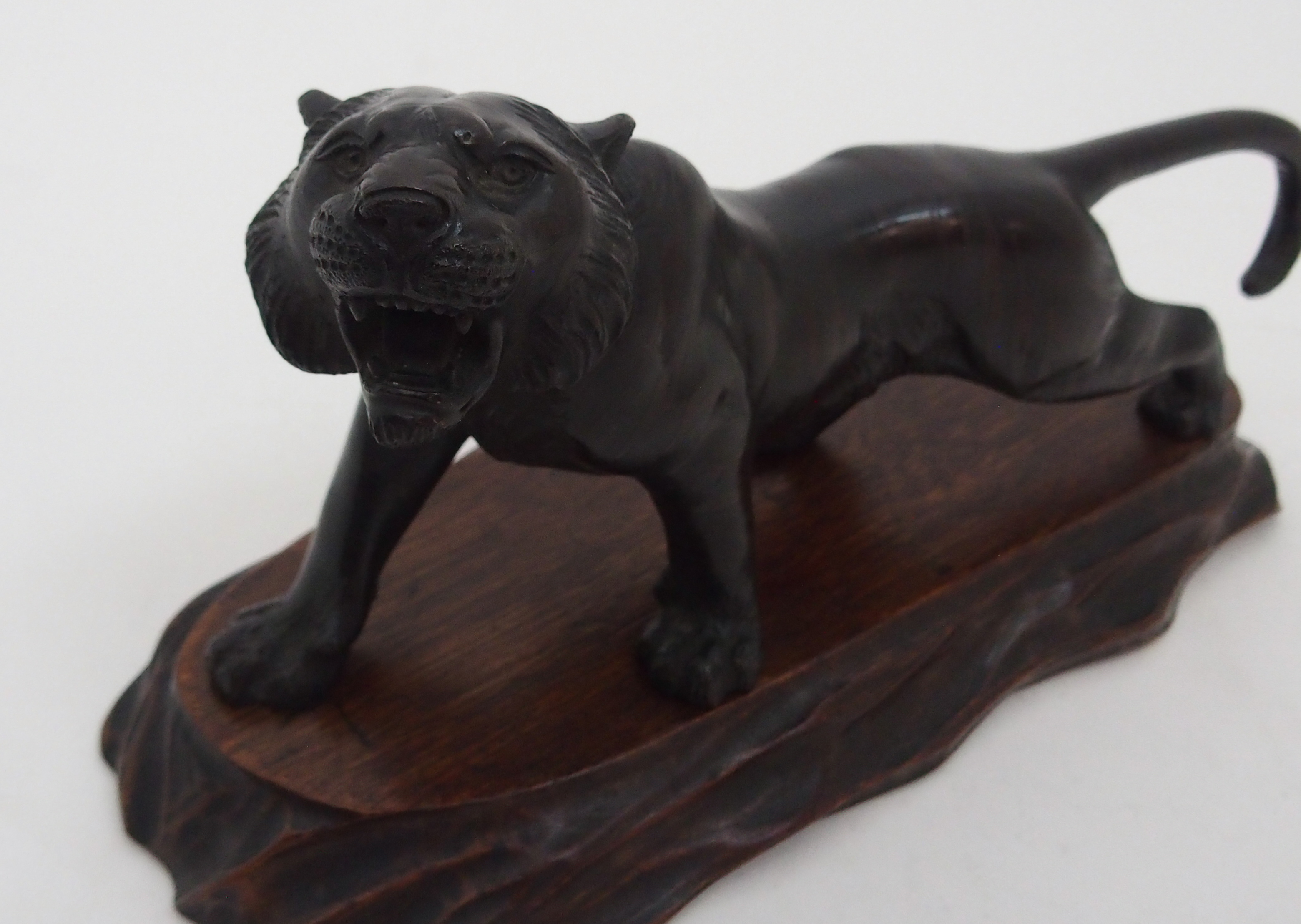 A JAPANESE BRONZE MODEL OF A TIGER prowling on all fours, signed, 11.5cm high and 24cm long, wood - Image 3 of 6