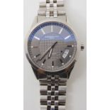 A STAINLESS STEEL RAYMOND WEIL AUTOMATIC GENTS WATCH with grey textured dial, silver coloured