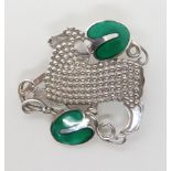 A SILVER GEORG JENSEN LAMB AND IVY BROOCH designed by Arno Malinowski, stamped Sterling Denmark with