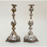 A PAIR OF GEORGE V SILVER CANDLESTICKS by John Round & Son Limited, London 1913, the removable