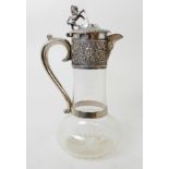 A LATE VICTORIAN SILVER MOUNTED CLARET JUG by Henry Wilkinson & Co. Limited, London 1898, the hinged