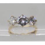 AN 18CT GOLD THREE STONE DIAMOND RING set with estimated approx 1.28cts of brilliant cut diamonds,