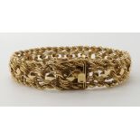 A 14K GOLD FANCY LINK BRACELET length 18.5cm, width 1.3cm, weight 32.3gms Condition Report: