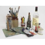 A QUANTITY OF ARTISTS PAINTING MATERIALS and a bottle of "The Famous Grouse", Alasdair's last bottle