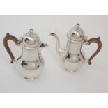 A THREE PIECE SILVER CAFE AU LAIT SET by Thomas Ducrow & Sons, Birmingham 1947, of baluster form