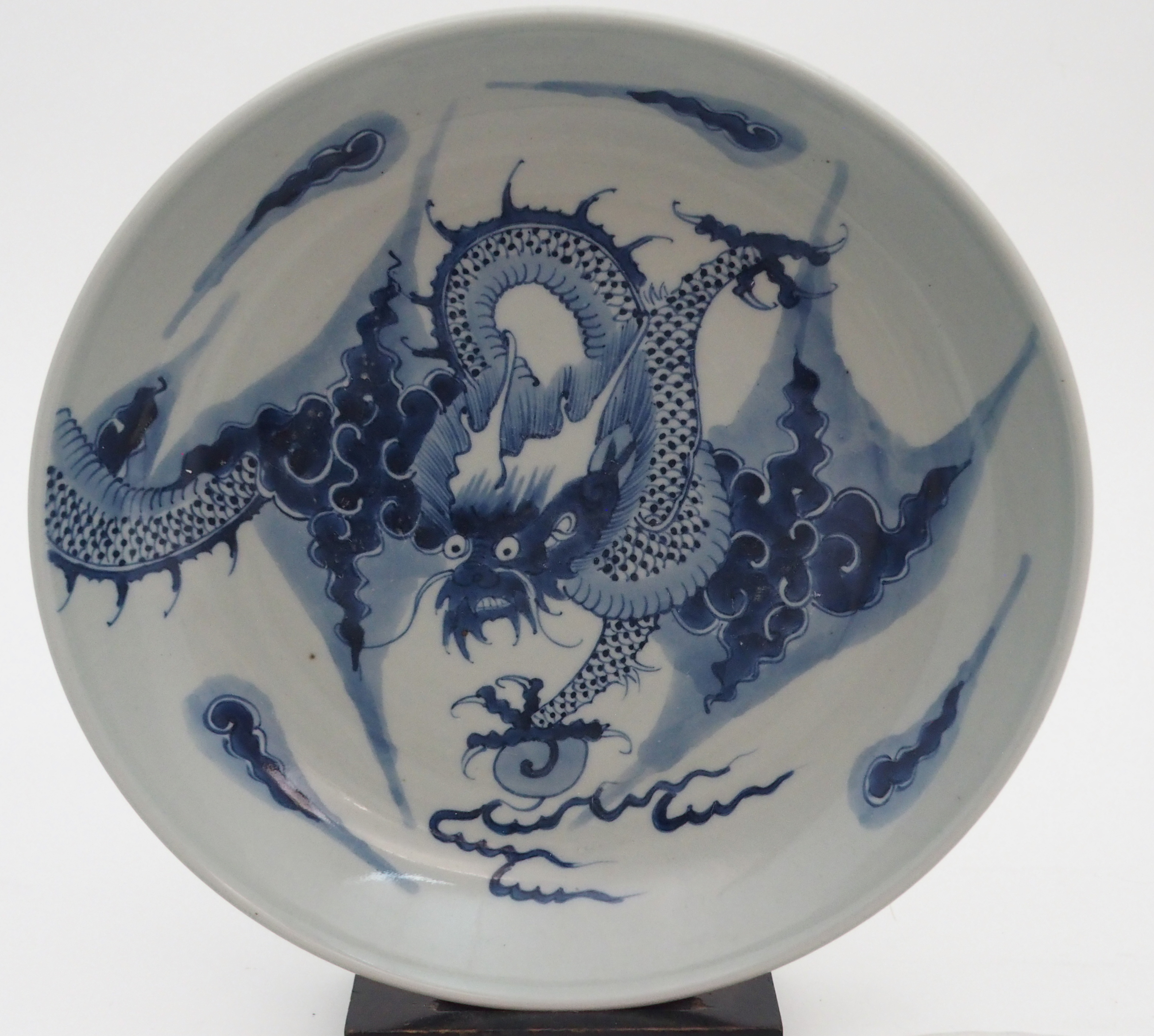 A CHINESE BLUE AND WHITE DISH painted with a dragon chasing the pearl of wisdom, 28cm diameter and - Image 2 of 9