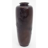 A JAPANESE BRONZE BALUSTER VASE cast with pigeon perched on blossoming branches, seal mark to