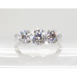 AN OLD CUT THREE STONE DIAMOND RING set with estimated approx combined total 1.40cts of diamonds,