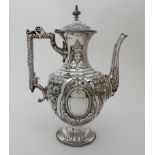 A LATE VICTORIAN SILVER COFFEE POT by Walker & Hall, Sheffield 1896, of bulbous form with slender