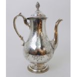 A VICTORIAN SILVER COFFEE POT probably by William Hunter, London 1842, of baluster shape with