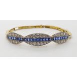 AN 18CT SAPPHIRE AND DIAMOND ART DECO BRACELET the three oval units are set with old cut diamonds