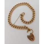 A 15CT GOLD CURB LINK BRACELET with heart shaped clasp, soldered on 15c tag to first link. Length