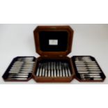 A TWENTY FOUR PIECE SILVER AND MOTHER OF PEARL DESSERT CUTLERY SET probably by Mappin & Webb,