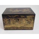 A CHINESE BLACK LACQUERED AND GILT TEA CADDY painted allover with warriors in conflict amongst