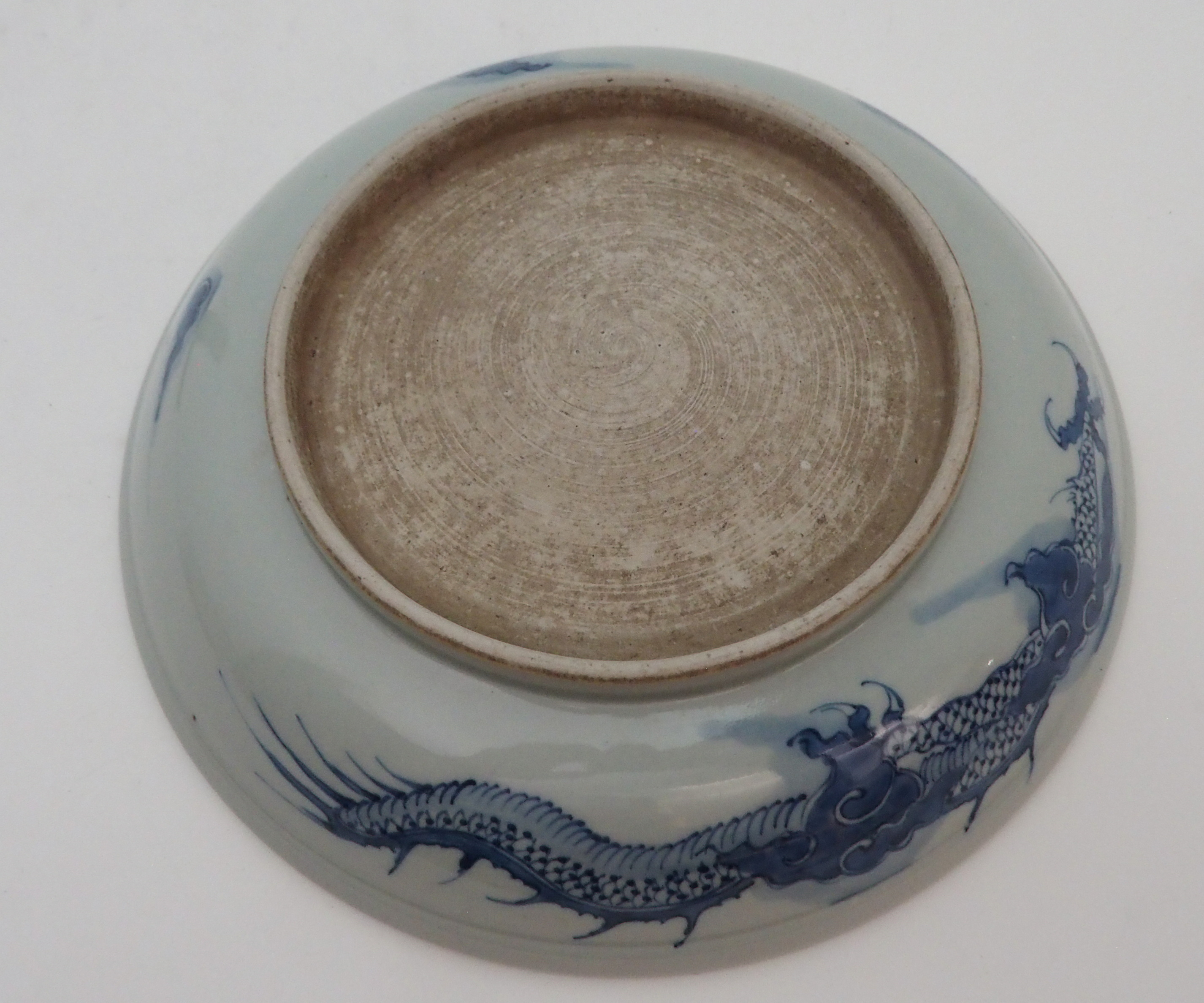 A CHINESE BLUE AND WHITE DISH painted with a dragon chasing the pearl of wisdom, 28cm diameter and - Image 9 of 9