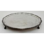 A LARGE SILVER SALVER by Goldsmiths & Silversmiths Co. Limited, London 1929 of circular form with