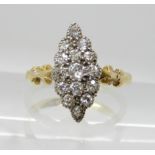 AN 18CT GOLD MARQUIS DIAMOND CLUSTER RING set with estimated approx 0.33cts of old cut diamonds,