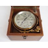 A MARINE CHRONOMETER BY THOMAS MERCER St. Albans, England, the silvered dial with Roman numerals,