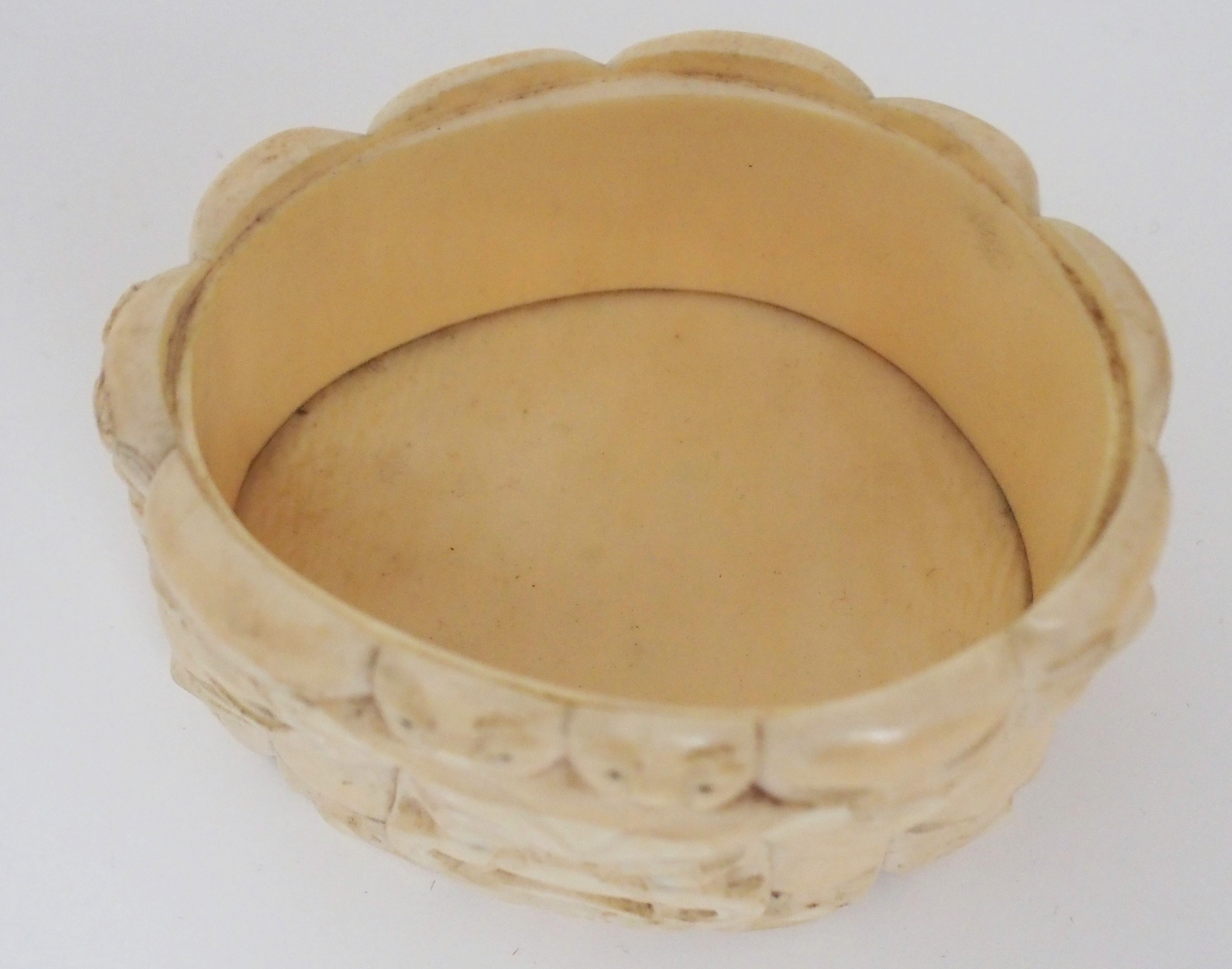 A JAPANESE IVORY OVAL MASK BOX AND COVER carved with many face masks, the cover with mask finial, - Image 11 of 14
