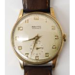 A GENTS 9CT GOLD BAUME WATCH HEAD with London import hallmarks for 1961-62, with cream dial, gold