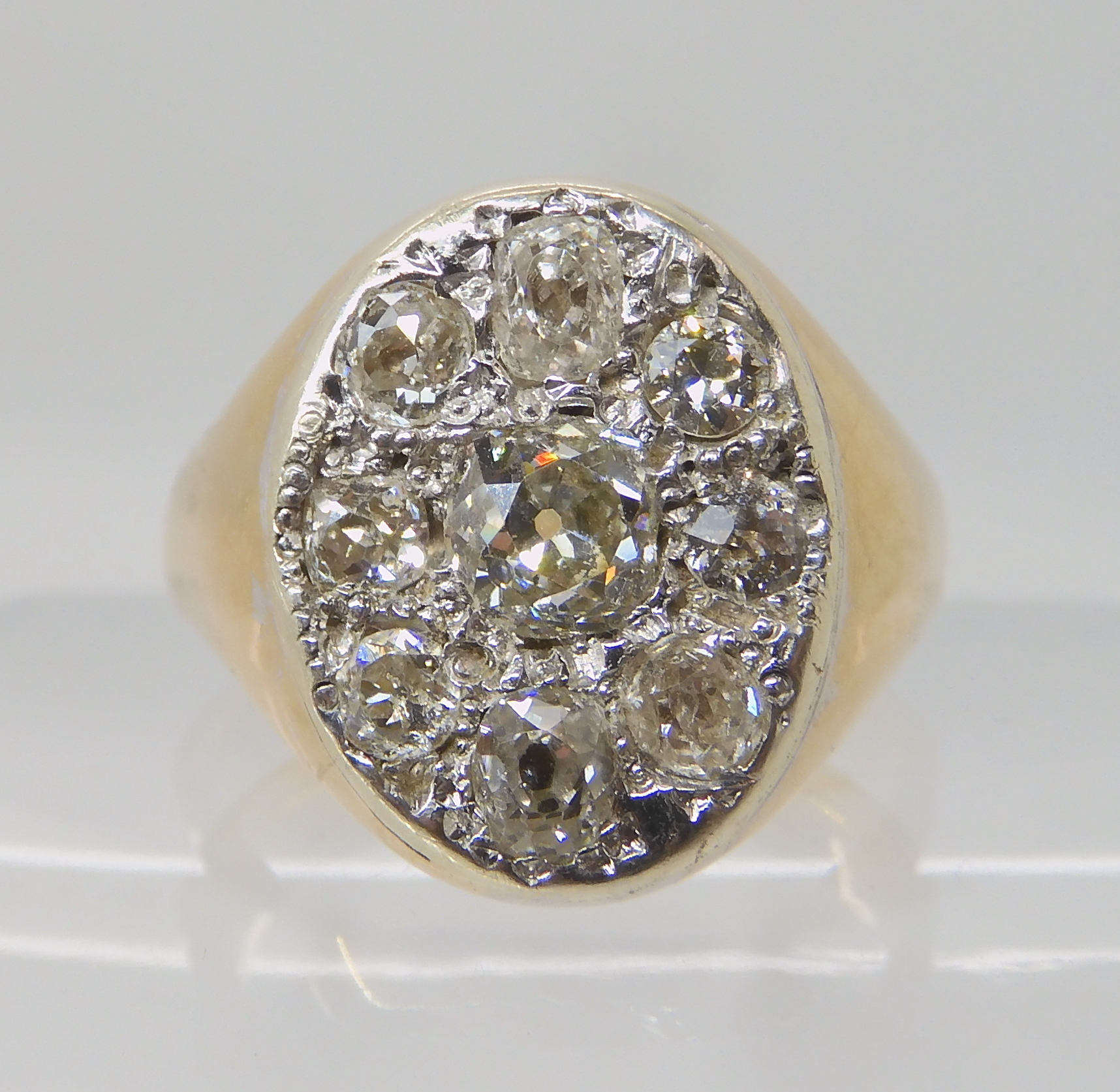 A 9CT GOLD GENTS DIAMOND SET SIGNET RING set with estimated approx 1.60cts of old cut diamonds,