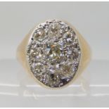 A 9CT GOLD GENTS DIAMOND SET SIGNET RING set with estimated approx 1.60cts of old cut diamonds,