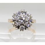 AN 18CT GOLD DIAMOND FLOWER RING set with estimated approx 1ct of diamonds in total. Finger size