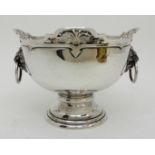 A SILVER PUNCH BOWL by Walker & Hall, Sheffield 1928, of classic shape, the rim with four lobes with