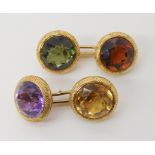 A PAIR OF 14K GOLD TUTTI FRUITI CUFFLINKS set with coloured glass gems, the bar stamped 585, head