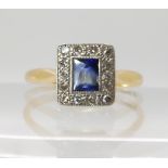AN 18CT GOLD SAPPHIRE ND DIAMOND RING an oblong cut sapphire of approx 4.8mm x 3.9mm x 2.4mm,