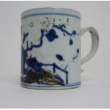 A CHINESE POLYCHROME NANKING CARGO MUG painted with Peony design, circa, 1750, 10cm high Condition