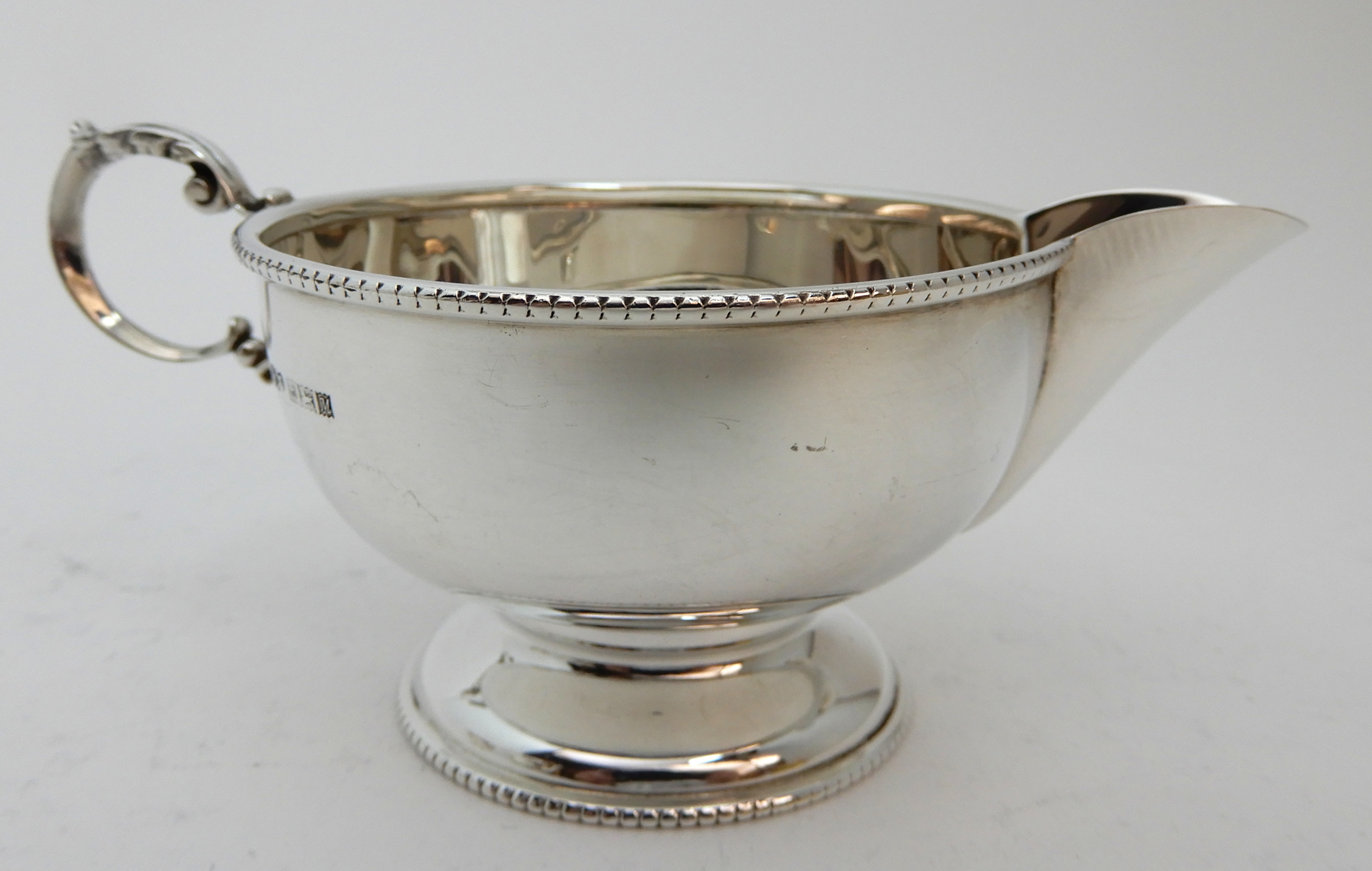 A FOUR PIECE SILVER TEA SERVICE by Henry Clifford Davis, Birmingham 1961, of plain baluster form - Image 6 of 8