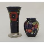 WILLIAM MOORCROFT FOR LIBERTY TUDRIC MOUNTED PANSY VASE of trumpet form, the base marked with