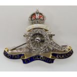 A DIAMOND SET ROYAL ARTILLERY SWEETHEART BROOCH made in platinum and 14ct gold with enamelled