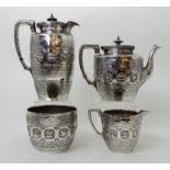 A FOUR PIECE SILVER TEA SERVICE by James Reid & Co, Glasgow 1890 (the water pot 1889), of tapering
