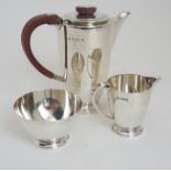 A THREE PIECE SILVER COFFEE SET by Adie Brothers Limited, Birmingham 1966, of tapering cylindrical