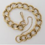 A 9CT YELLOW GOLD GENTS CURB LINK BRACELET hallmarked to every link, length approx 23cm, each link