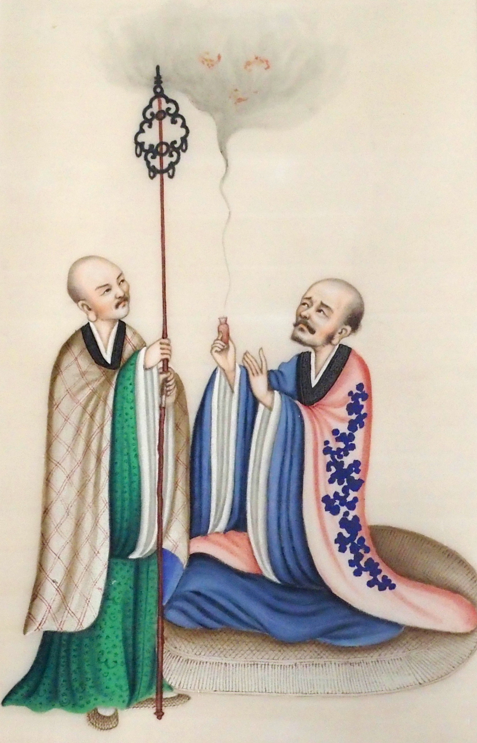 A CHINESE EXPORT RICE PAPER PAINTING the watercolour depicting two mystics, 29 x 18cm, figures in