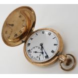 A 9CT GOLD FULL HUNTER POCKET WATCH with cream dial, subsidiary seconds dial, black Roman numerals