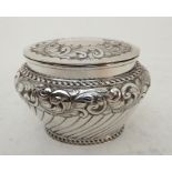 A LATE VICTORIAN SILVER TEA CADDY unclear maker's marks, Birmingham 1897, of tapering oval form, the
