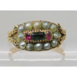 AN EARLY VICTORIAN PEARL AND GEM SET RING the yellow metal shank with reeded pattern and flowers