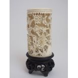 A CANTON CARVED IVORY TUSK decorated with birds amongst flowers and foliage on a trellis pattern