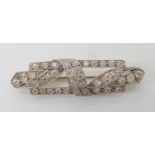AN 18CT GOLD AND PLATINUM DIAMOND ART DECO BROOCH set with estimated approx 0.90cts, dimensions 4.